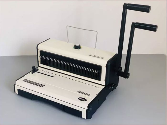Біндер на металеву пружину YIBO T970R круглі отвори